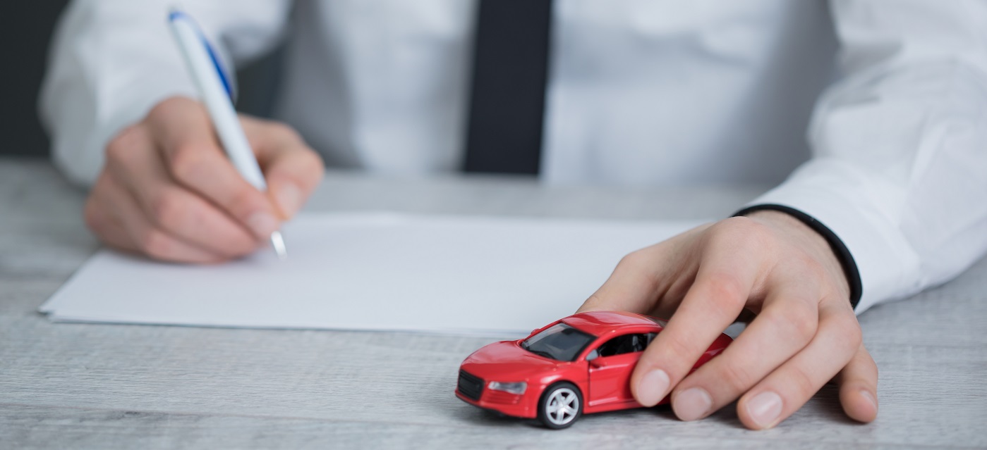 hand document with car model